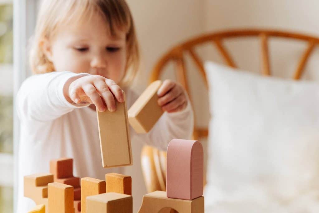 Girl building blocks